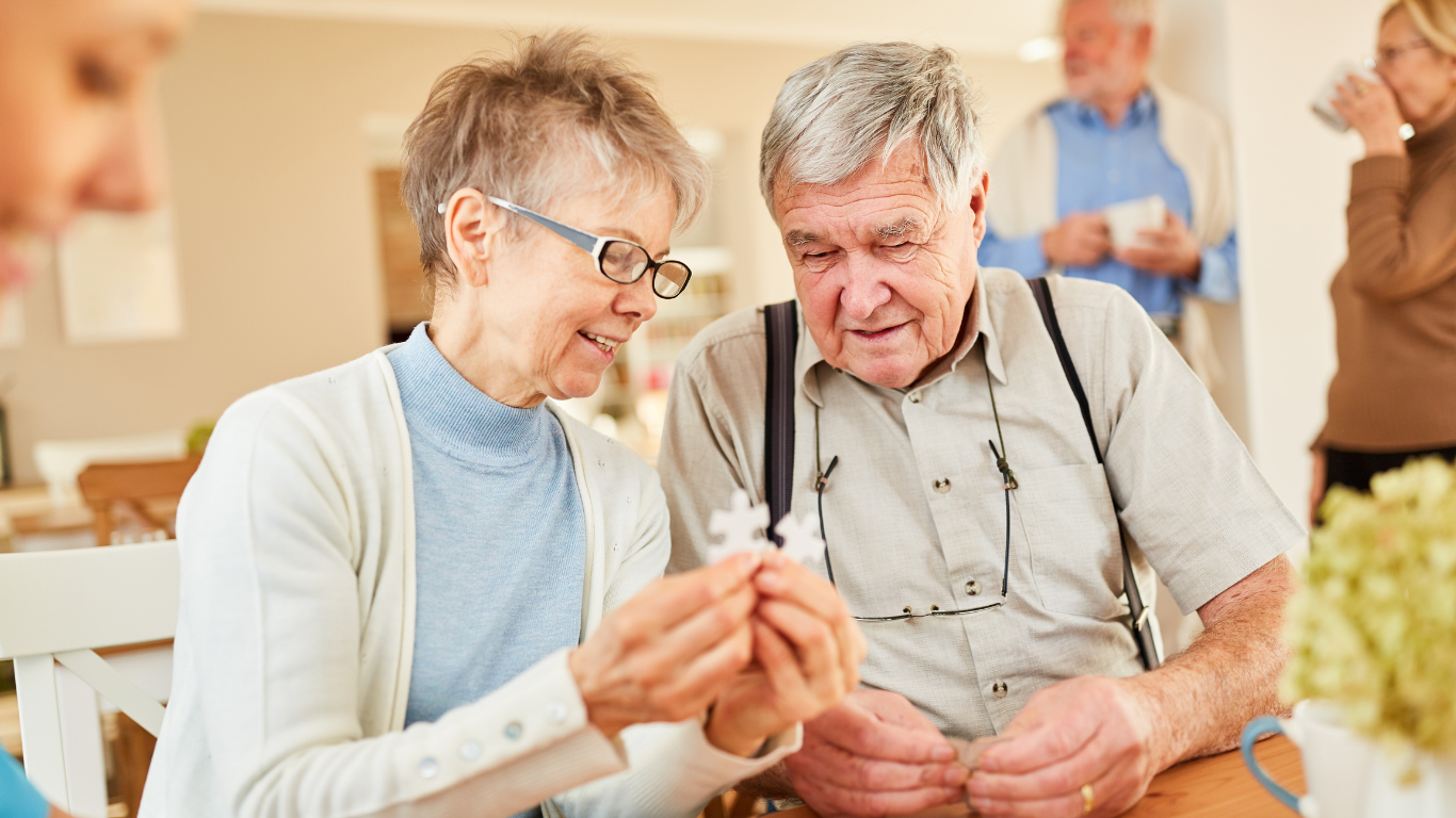 Senior couple solving a puzzle