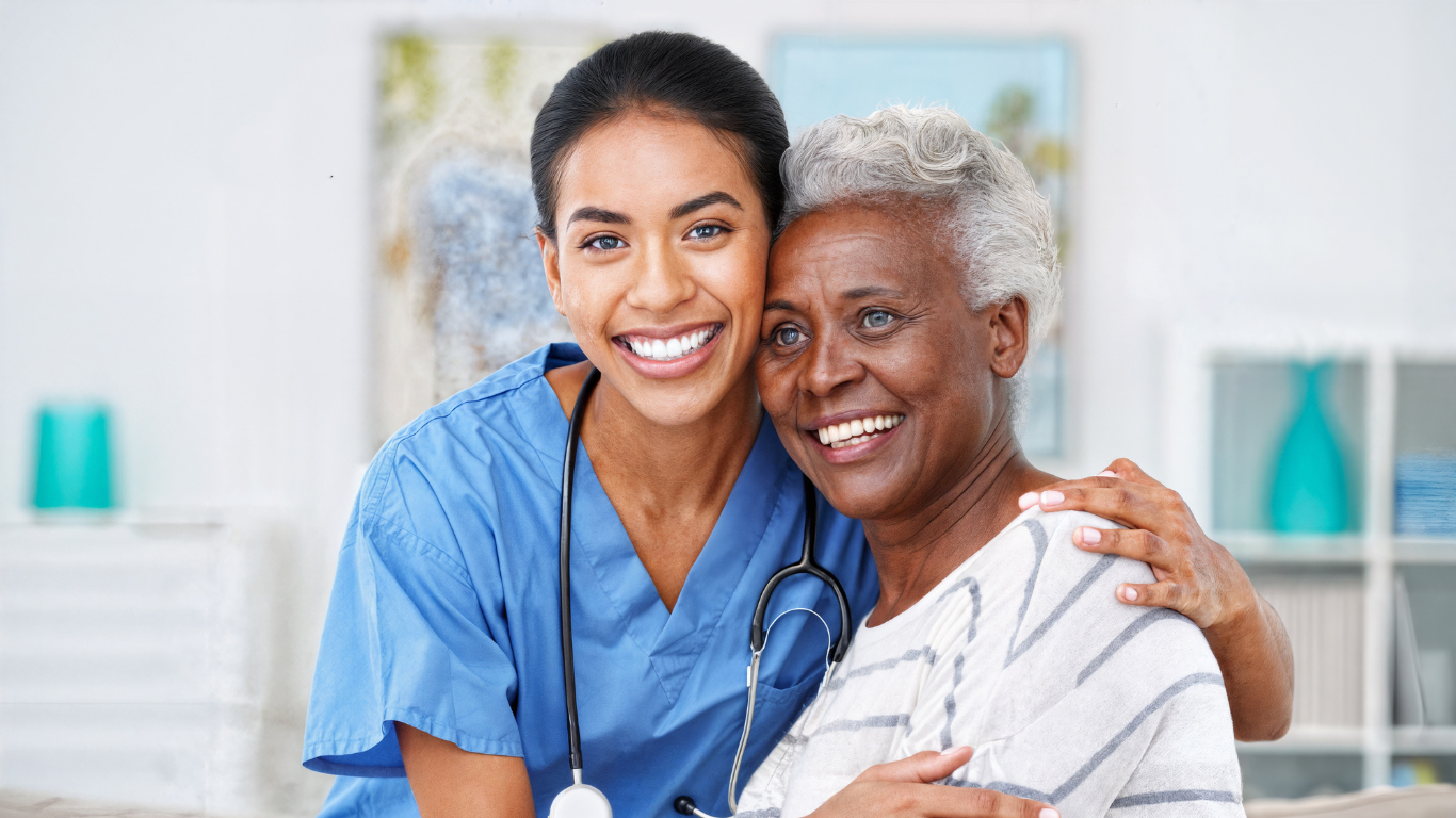 Smiling nurse and senior woman