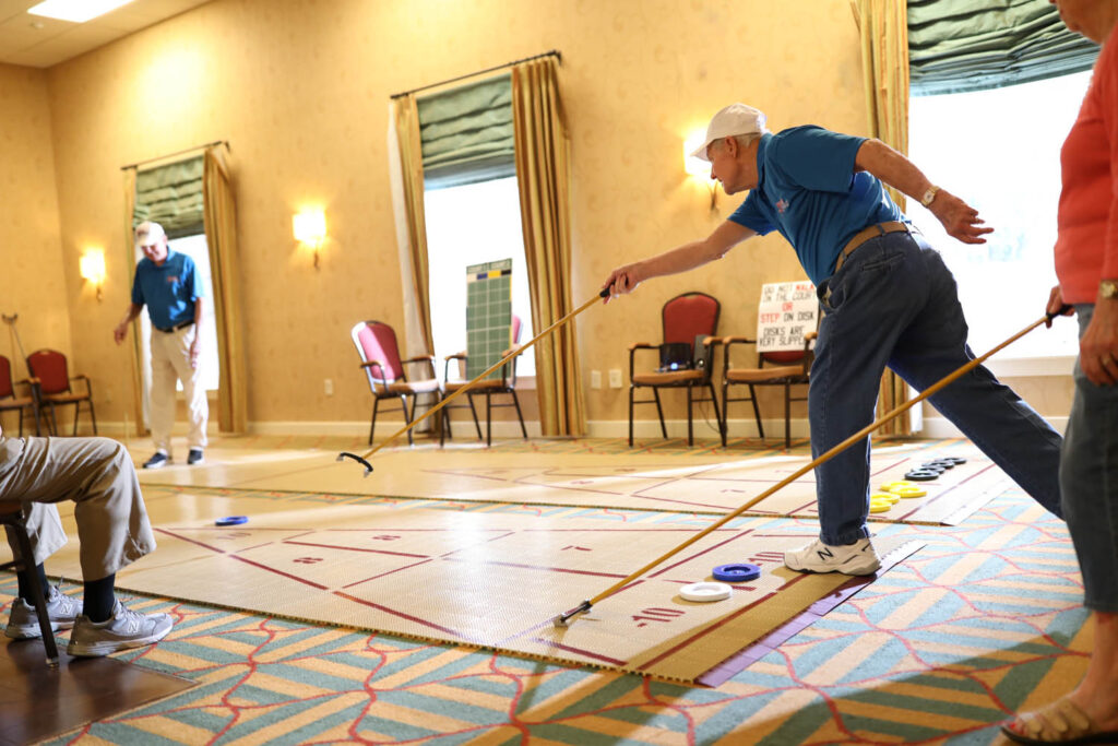 residents enjoying shuffleboard