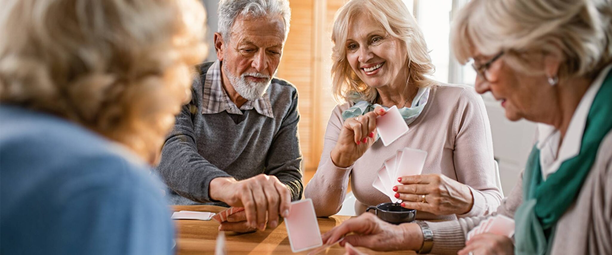 A group of seniors come together to play a game